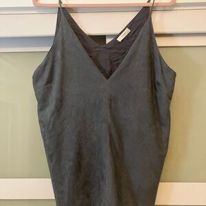 Faux suede slate blue sleeveless top with side slits.